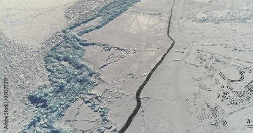 Lake Baikal in winter. The abstract and dense lines of ice. A popular travel destination in Russia. Aerial view of the ice.