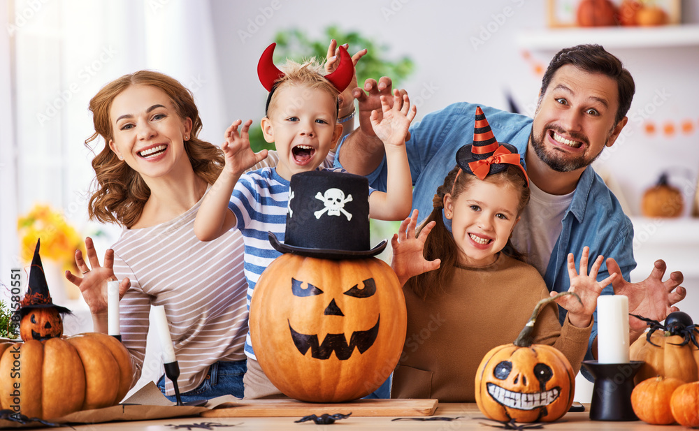 Fototapeta premium Delighted family during Halloween celebration.