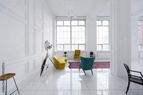 modern fashionable futuristic interior design of a spacious white hall with black and yellow furniture