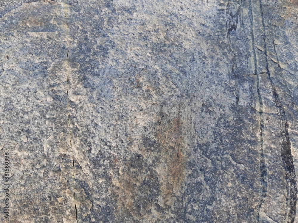 Natural background of rock in riverside india. Stones texture and background. Rock texture. Rock fragment. Abstract background. A fragment of rock. Natural background of rock in riverside india. Stones texture and background. Rock texture. Rock fragment. Abstract background. A fragment of rock.