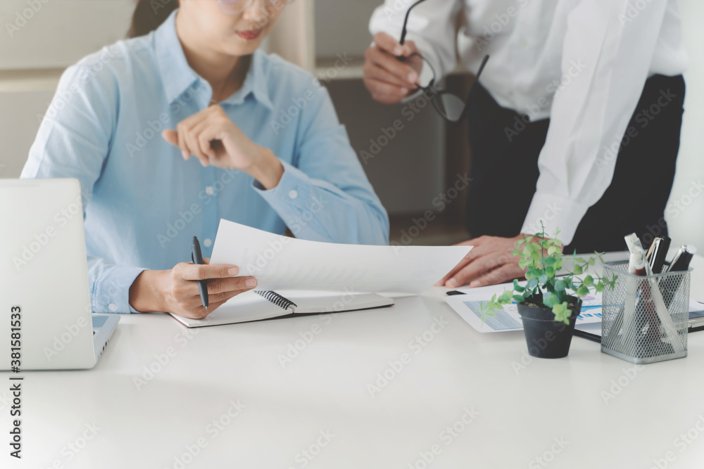 Senior businessman helping new employee intern in company. Senior businessman helping new employee intern in company.