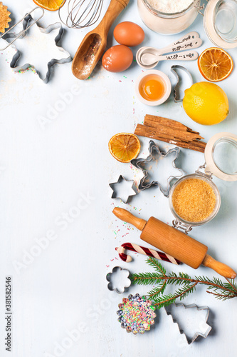 Fototapeta Naklejka Na Ścianę i Meble -  Ingredients for Christmas baking - flour, spices, eggs and cookie cutters.