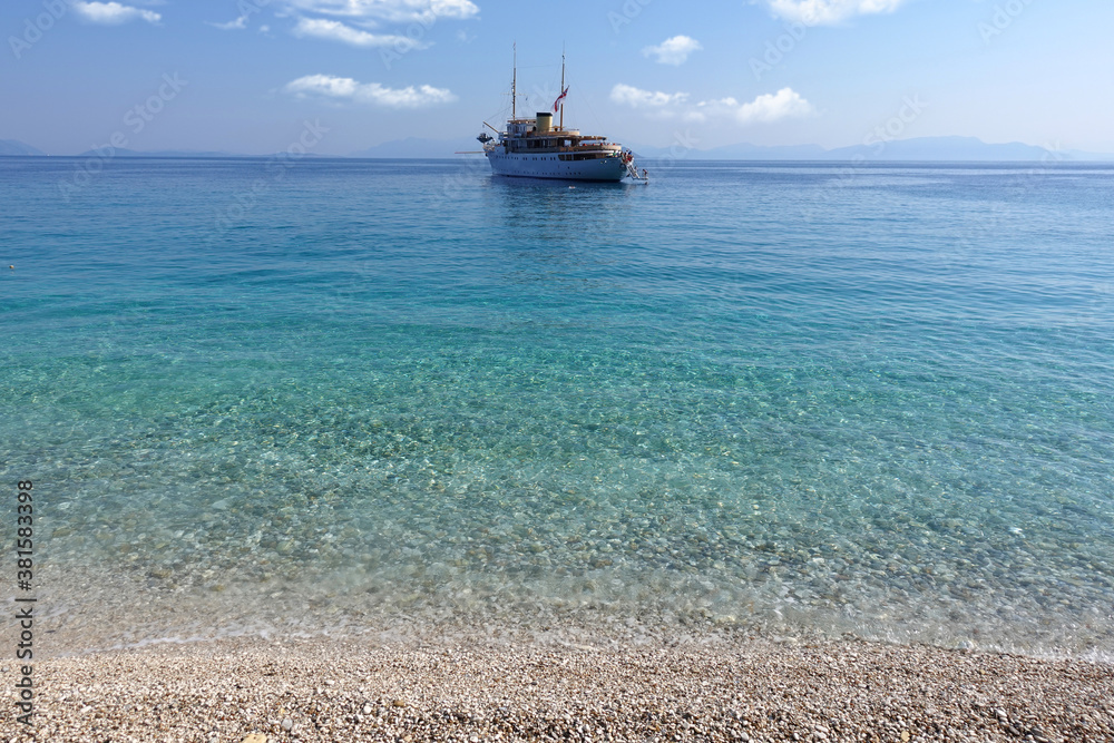 Obraz premium Beautiful turquoise paradise secluded pebble beach of Gidaki only accessible by path, Ithaki or Ithaca island, Ionian, Greece