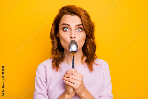 Portrait of shocked crazy woman close cover her mouth with spoon want eat dessert try healthcare vegan snack wear trendy pullover isolated over shine color background