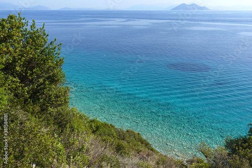 Beautiful turquoise paradise secluded pebble beach of Gidaki only accessible by path, Ithaki or Ithaca island, Ionian, Greece