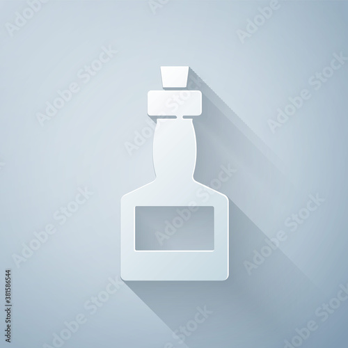 Paper cut Tabasco sauce icon isolated on grey background. Chili cayenne spicy pepper sauce. Paper art style. Vector.
