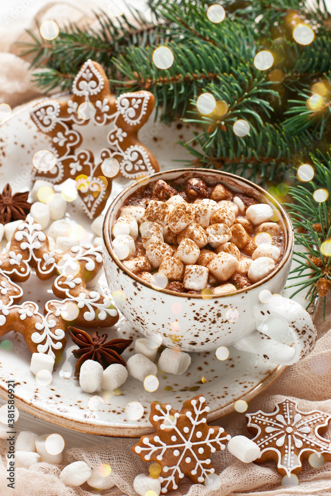 Fototapeta premium Mug with hot chocolate and gingerbread cookies on wooden table