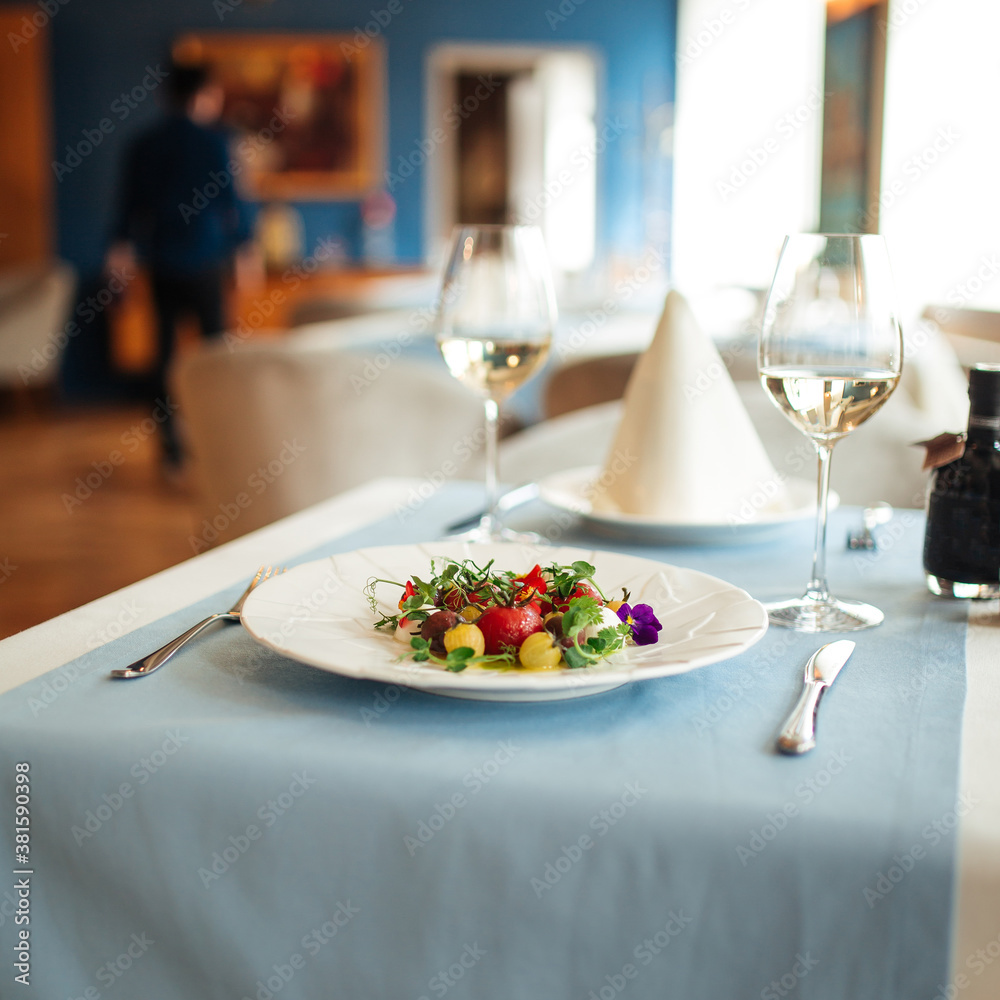 Spanish peeled tomato salad on restaurant table
