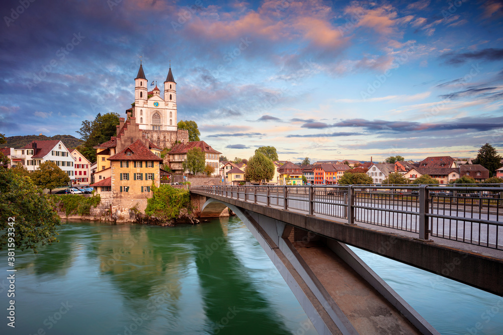 Aarburg, Switzerland. Cityscape image of beautiful city of Aarburg with the reflection of the city in the Aare river at sunset.