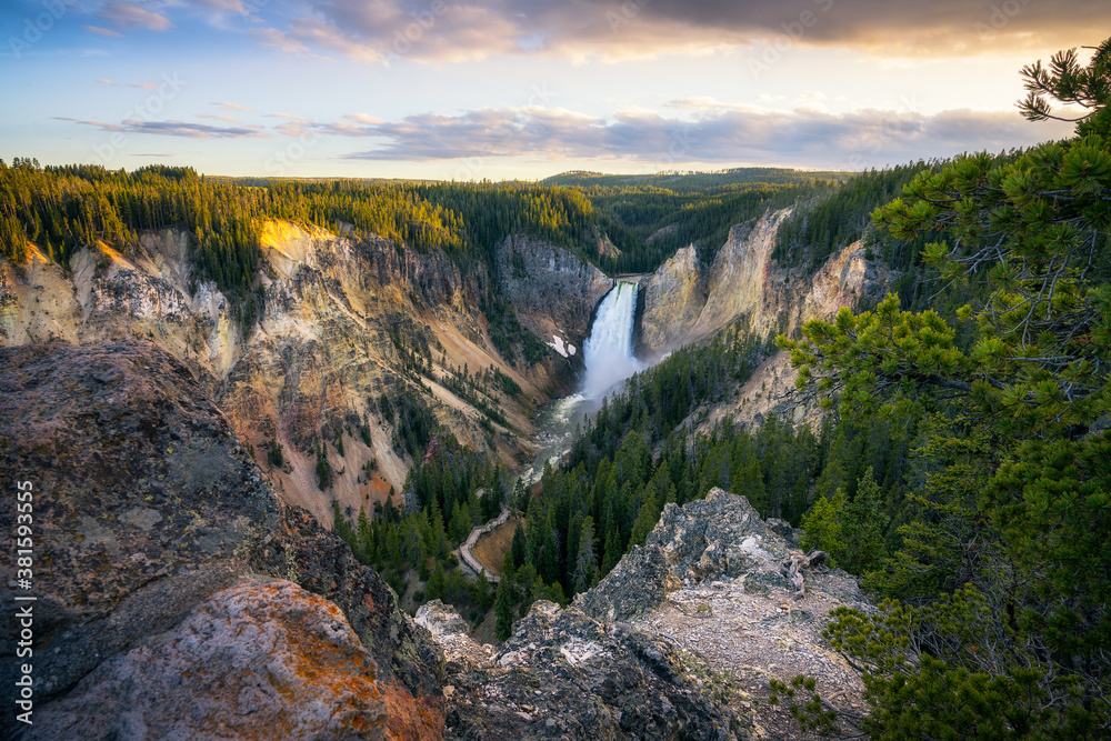 lower falls of the yellowstone national park at sunset, wyoming, usa