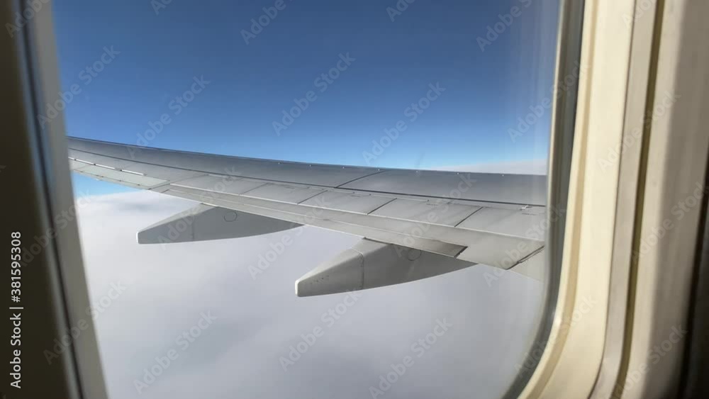 The aircraft wing during a flight. Aeroplane. Travelling concept. The aircraft wing during a flight. Aeroplane. Travelling concept.