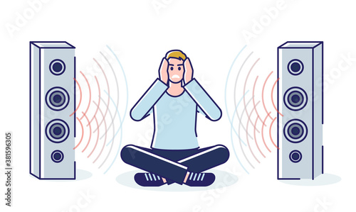 Man tired of loud music from loudspeakers covering ears with hands sitting on floor