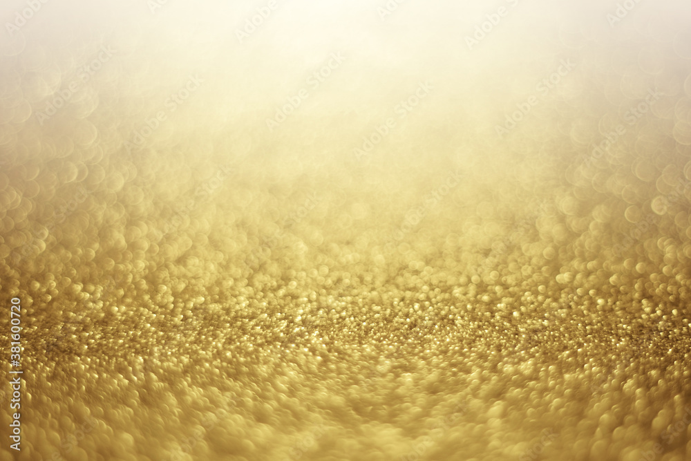 gold bokeh glitter abstract background for Christmas and Valentine.