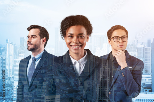 Front view of three successful business consultants standing in a row in suits and ready to tackle with customer problem. Kuala Lumpur cityscape. KL skyscrapers. Double exposure. photo