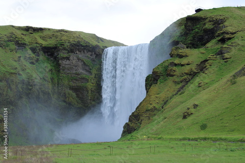 Skogafoss Waterfall in South Iceland on a misty summer day
