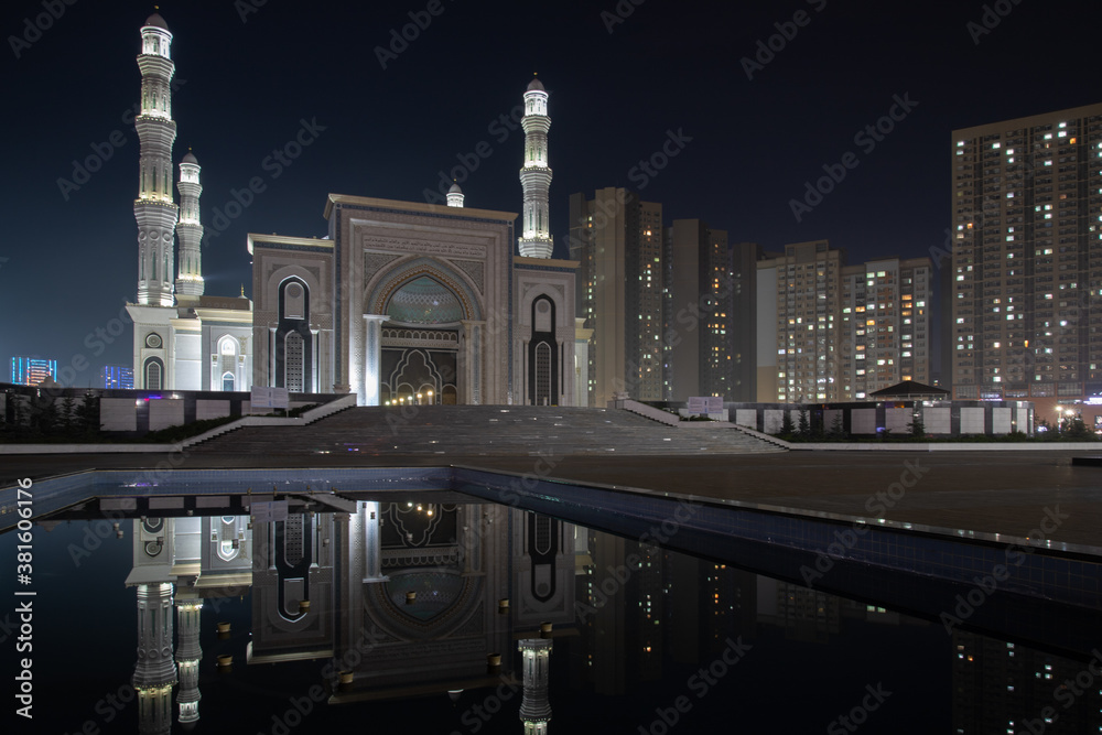 View of Hazret Sultan Mosque at night in Nur-Sultan, the capital of Kazakhstan. View of Hazret Sultan Mosque at night in Nur-Sultan, the capital of Kazakhstan.