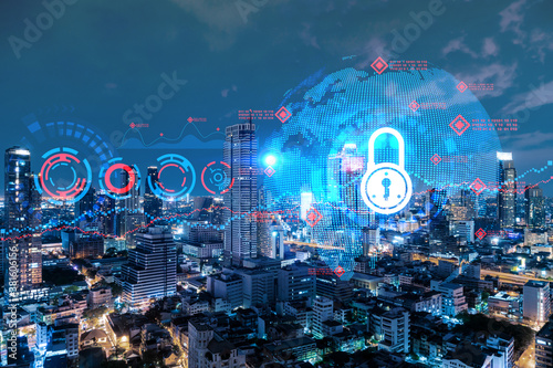 Glowing Padlock hologram  night panoramic city view of Bangkok  Asia. The concept of cyber security to protect companies. Double exposure.