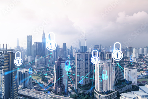 Photography Padlock icon hologram over panorama city view of Kuala Lumpur to protect business, Malaysia, Asia