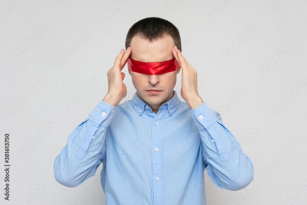 Person grabbed his head, man can't solve a difficult task, red ...