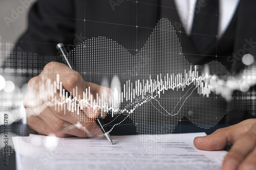 Tableau sur toile Businessman in suit signs contract