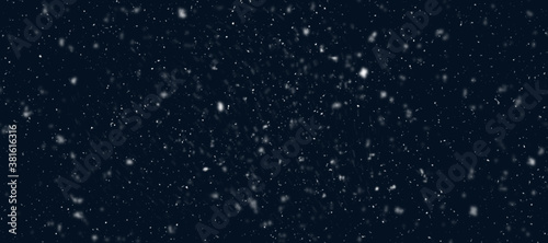 Heavy snowfall with real snowflakes. Heavy snowfall with real snowflakes on black background. Illustration for winter scenes.
