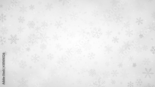 Christmas background of snowflakes of different shapes, sizes and transparency in gray and white colors