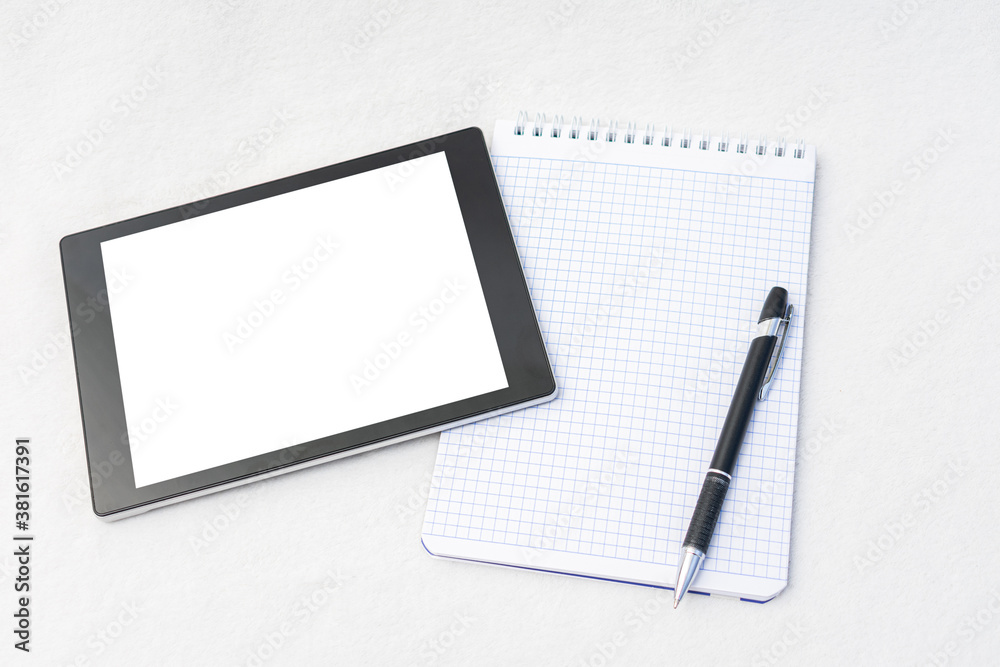 Notebook, pen and tablet, closeup, top view, copy space Notebook, pen and tablet, closeup, top view, copy space