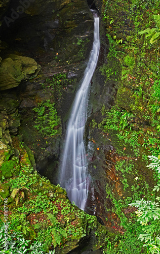 Fototapeta Naklejka Na Ścianę i Meble -  Dropping water at St Nectan's waterfall in Cornwall