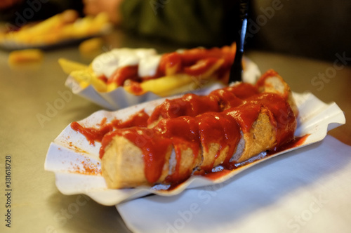 Photography Closeup of a traditional german Curry Wurst from a diner called Curry 36 in Ber