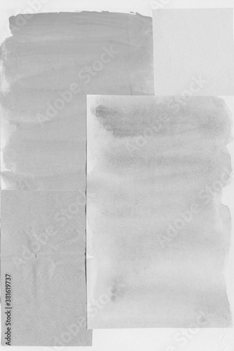 White torn paper collage close-up. Texture made from various paper and cardboard parts. Damaged old paper background. Vintage blank wallpaper. Material design backdrop. © artistmef