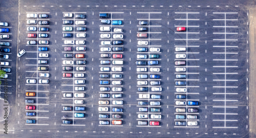 Top view of wide road with markings and lots of cars at day Top view of wide road with markings and lots of cars at day