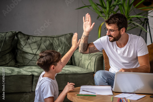 The father and son agreed to play and hang out as soon as the father finished the online business