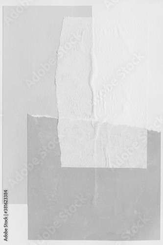 White torn paper collage close-up. Texture made from various paper and cardboard parts. Damaged old paper background. Vintage blank wallpaper. Material design backdrop. © artistmef