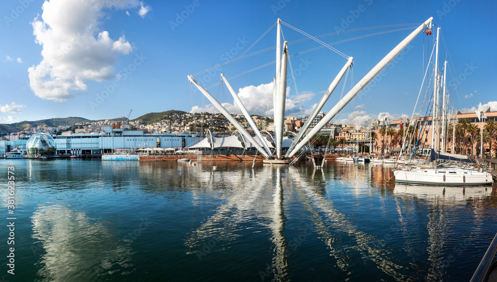 Genoa, Italy: panoramic lift 'Bigo' in the centre of the ancient port area of Genoa, with the historical city on the back ground.