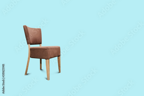 Retro chair on a blue pastel background. Utilities concept  empty chair on concrete.