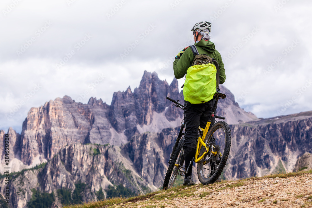 Cyclist on the trail of the Dolomites, Italy