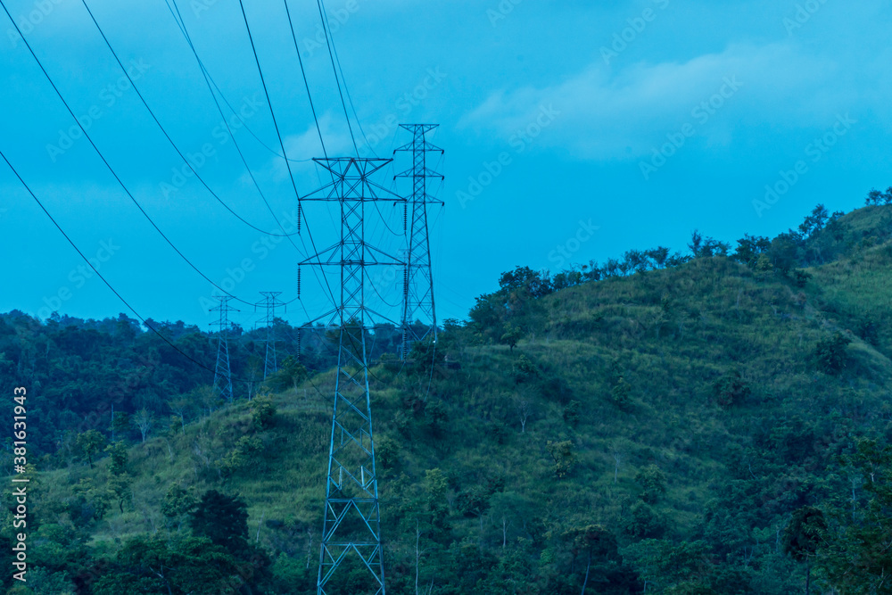 Obraz premium High voltage tower lines in the mountains