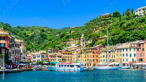 Tela Portofino, Italy - Harbor town with colorful houses and yacht in little bay