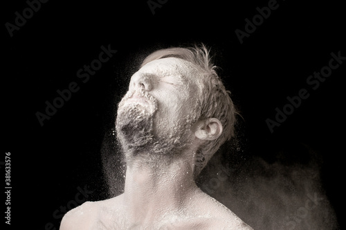 portrait of a guy in white powder