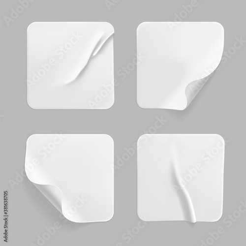 White square glued stickers with curled corners mock up set. Blank white adhesive square paper or plastic sticker label with wrinkled, crumpled effect. Blank template label tags. 3d realistic vector