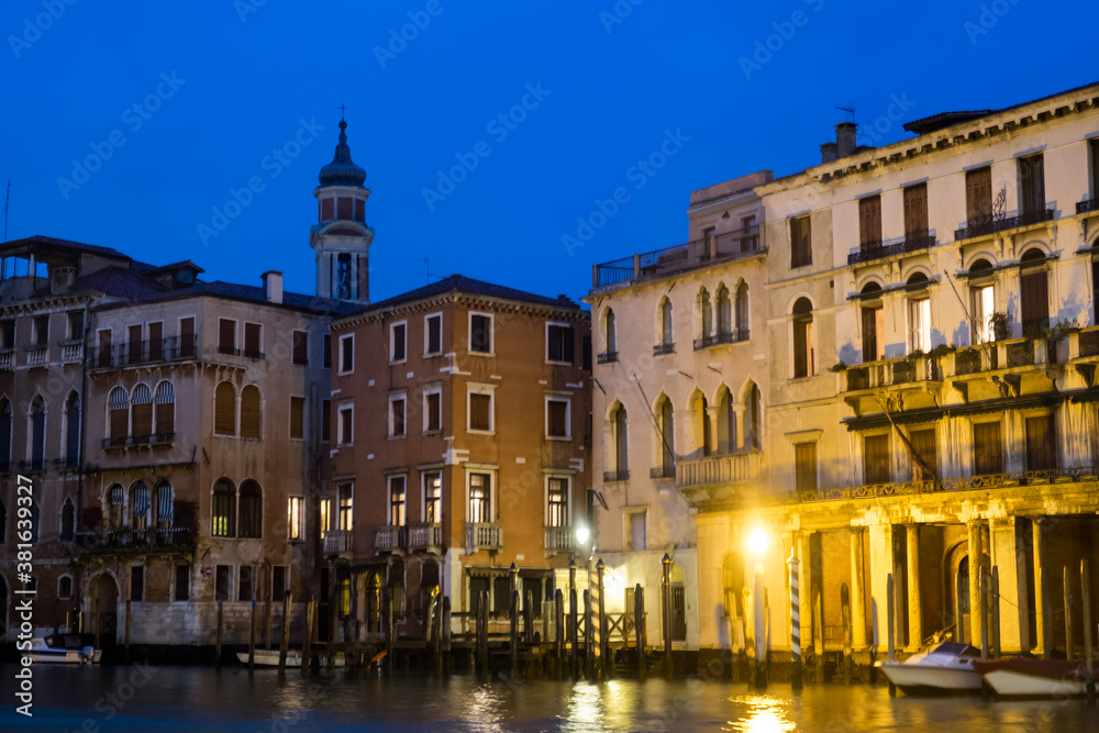 Night city lights of beautiful Venice, Italy, during the rain
