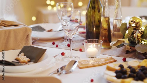 A table set for dinner meal at Christmas time. photo