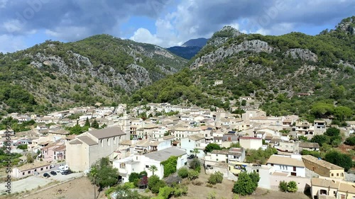 Aerial view, flight over the village of Caimari, Tramuntana Mountains, Campanet Region, Mallorca, Balearic Islands, Spain photo