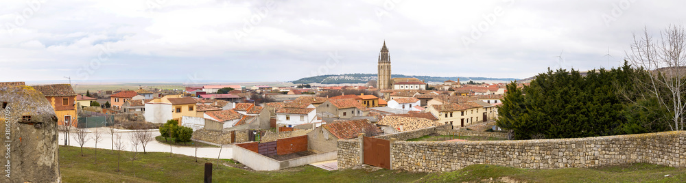Panoramic view of the Town of Ampudia with the tower of the Collegiate Church, Palencia, Spain Panoramic view of the Town of Ampudia with the tower of the Collegiate Church, Palencia, Spain