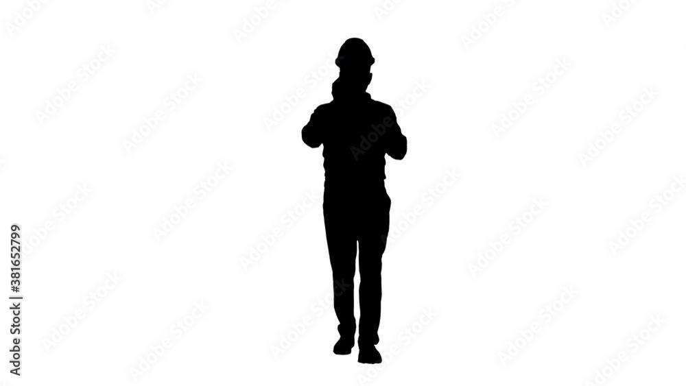Architect talking by the phone while walking, Alpha Channel Architect talking by the phone while walking, Alpha Channel