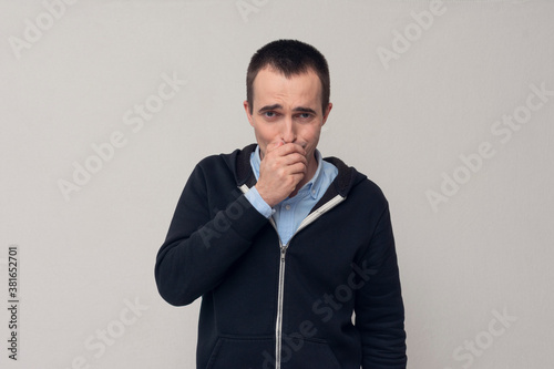 Man feeling bad, guy coughing, white background