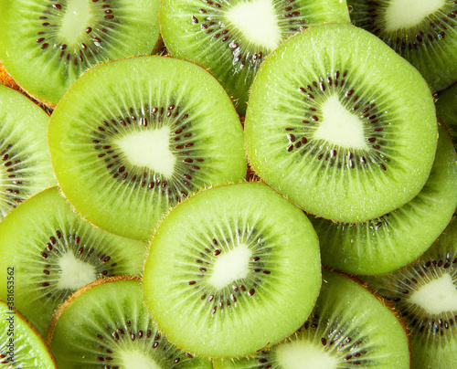  kiwi fruit on a background