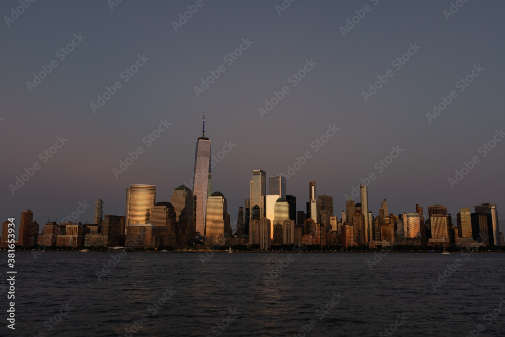 Lower Manhattan Skyline right after Sunset along the East River in New York City