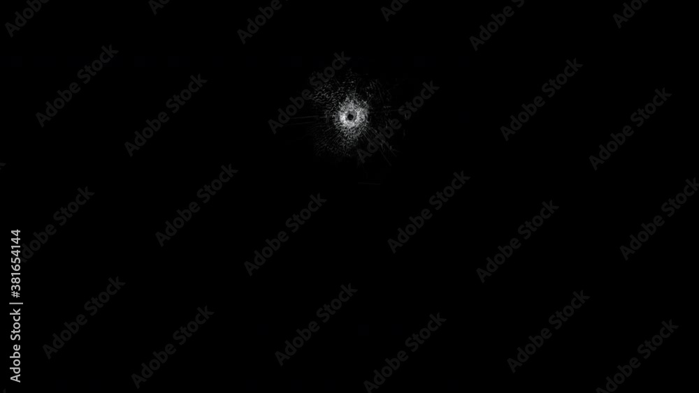 Gunshot hole mirror crack.