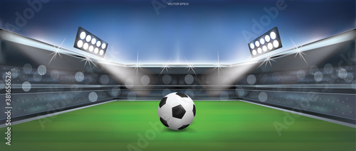 Soccer football ball on green grass of soccer field stadium background. Vector.